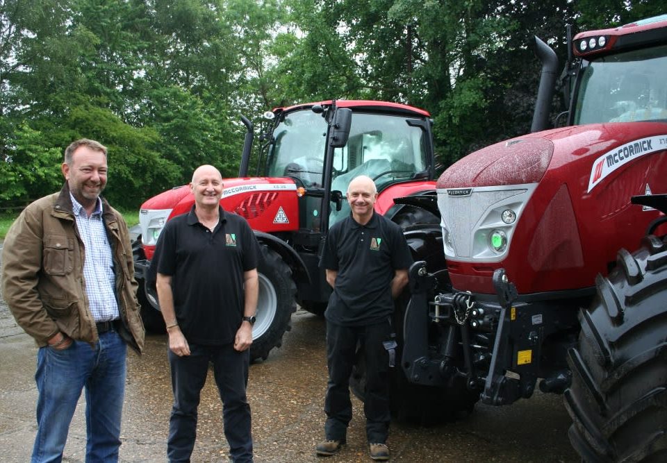 Venture Farm Machinery partners Jim Pearson and Nigel Gardiner with Derek Lispcombe.